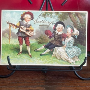 EA53G, Ellen Clapsaddle, rare, antique, carte postale de Pâques, voeux de Pâques, voeux de Pâques, deux garçons faisant la cour à une jeune femme, Allemagne