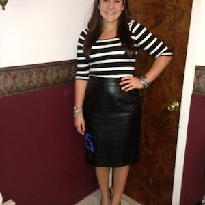 Aimee Black Leather pencil skirt with the Royal blue and gold flower