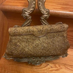 Gold evening bag made by FREDDY FROM PARIS