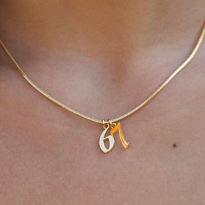 gold number necklace on a snake chain necklace 16"