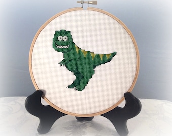 T-rex finished cross stitch piece, completed tyrannosaurus rex embroidery, wall hanging, home accent, home decor, nursery decor, dinosaur
