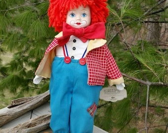 Chips Wind Up Musical Porcelain Clown Doll by Russ 1984