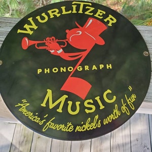 Round Porcelain Enameled Wurlitzer Phonograph Music Advertising Sign Ande Rooney Sign / Porcelain EnameledMusic Advertising Sign   #1160