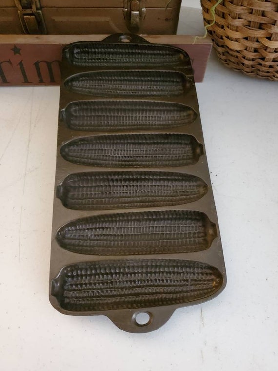 vintage cast iron cornbread pan for corn stick muffins, ears of