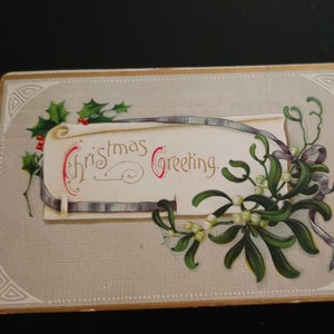Christmas Greeting Sign with Holly, Berries, & Ribbon Embossed Vintage Postcard Paper Ephemera Collectible