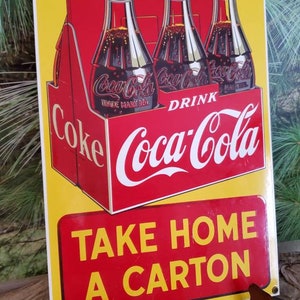 Bebida Coca-Cola "Take Home A Carton" de 1993 Cartel publicitario de porcelana vintage de Coca-Cola con Ande Rooney, n.° 2927