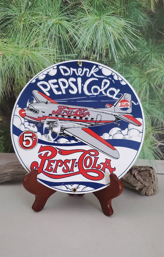 Vintage Pepsi Cola Airplane Porcelain Sign: Ande Rooney