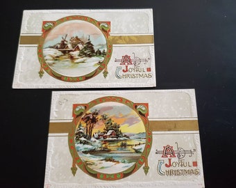 May include: Two vintage Christmas postcards with a winter scene of a house and a windmill in a snowy landscape. The postcards have a gold border and the text "A Joyful Christmas".