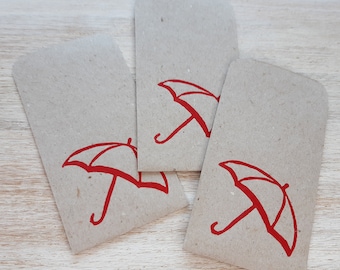 3 mini red umbrella gift bags // 6 x 9 cm // handmade from recycled sketch paper