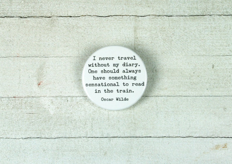 Quote Oscar Wilde I never travel without my diary. One should always have... // Button or magnet // 38 mm image 1