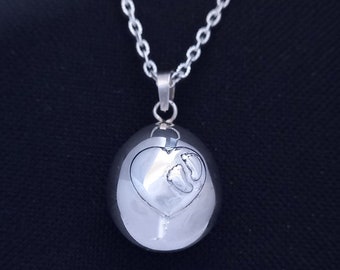 Unique Sterling Silver Egg shape Harmony Ball set with a Heart featuring Baby Feet - Simply Superb Harmony Ball for a Special Pregnancy Gift