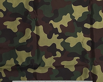May include: Camouflage fabric with a green, brown, and tan pattern. The fabric has a satin finish.