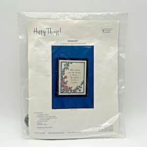 May include: A cross stitch kit in a clear plastic package. The kit features a framed design with the text "When someone you love becomes a memory, the memory becomes a treasure." The design is 8" x 10".