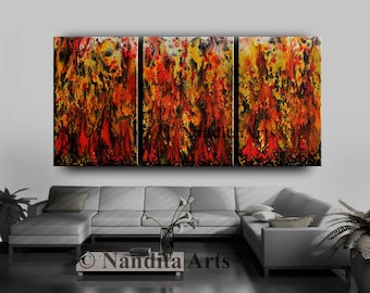 May include: Abstract triptych painting with a fiery, orange, yellow, and black color scheme. The painting is displayed on a wall above a gray sectional sofa.