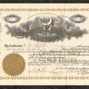 May include: Antique Moon-Anchor Gold Mining Company stock certificate. The document features ornate text, a gold seal, and decorative anchors. The company name is displayed above a stylized anchor.