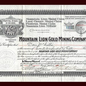 May include: An antique Mountain Lion Gold Mining Company stock certificate, featuring ornate borders and text. The document includes the company name, claims, and the number of shares. The certificate is dated 1905.