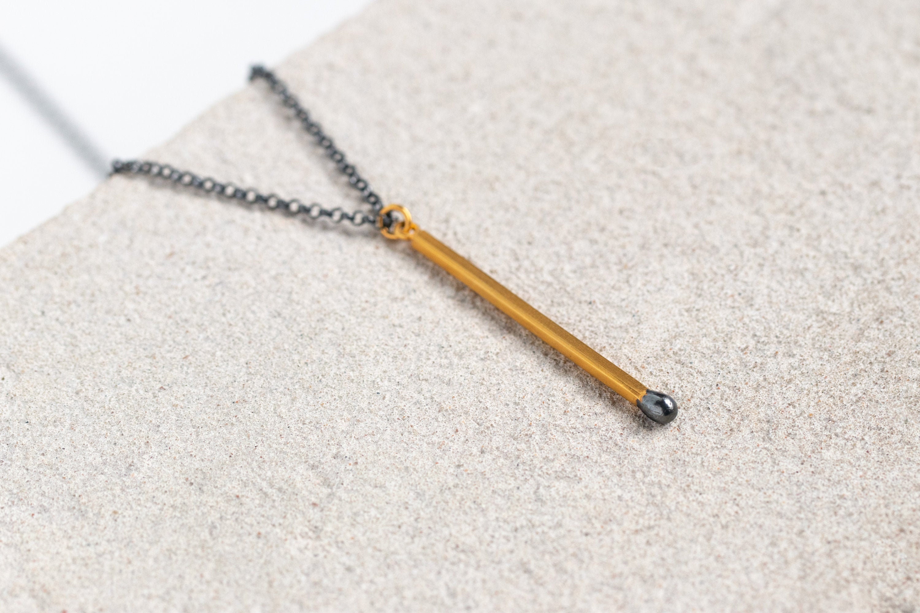 Golden Unlit Matchstick Pendant 