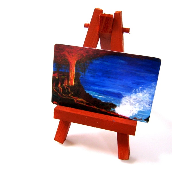 Pele's Fury, a miniature painting and easel