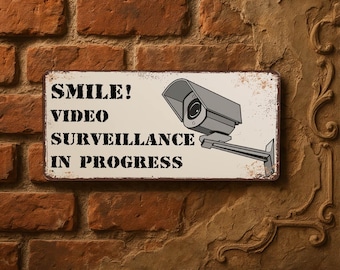 Sorridi! Cartello in metallo con videosorveglianza in corso 15 x 30 cm – Divertente cartello con videosorveglianza in funzione per casa o azienda, decorazione murale di sicurezza