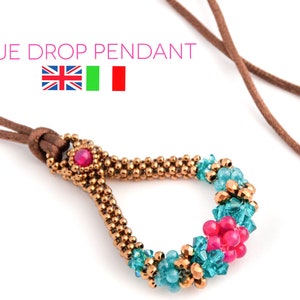 Può includere: Una collana in cordoncino di cuoio marrone con un ciondolo di perline blu e rosa. Il ciondolo ha la forma di una lacrima e presenta una piccola pietra preziosa rossa al centro.