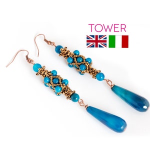 May include: A pair of long, dangle earrings featuring blue agate teardrop stones and gold-toned beads. The earrings are crafted with copper wire and have a delicate, intricate design.