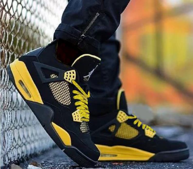 Our custom yellow speckled or yellow cement laces are perfectly paired with the Nike Jordan 4 Yellow Thunder. The speckle or cement print as sneaker enthusiasts like to call it, are an homage to the retro colorways and prints of the original Nike Jordan sneakers that were created in the 1990s.