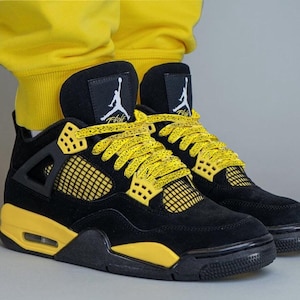 Our custom yellow speckled or yellow cement laces are perfectly paired with the Nike Jordan 4 Yellow Thunder. The speckle or cement print as sneaker enthusiasts like to call it, are an homage to the retro colorways and prints of the original Nike Jordan sneakers that were created in the 1990s.