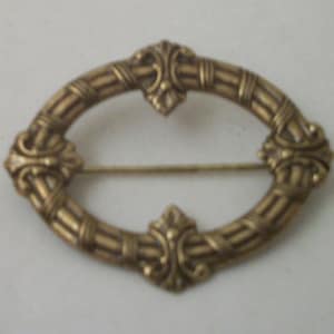 Vintage Haskell brass small oval pin / brooch