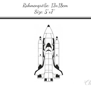 May include: Black and white line drawing of a space shuttle, with the text "Rahmengröße: 13x18cm Size: 5" x 7" "