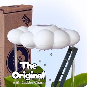 May include: A set of three ceramic mugs with a speckled, matte finish. The mugs are in shades of cream, light gray, and dark gray. Each mug has a simple, minimalist design, perfect for coffee or tea.