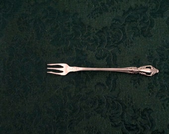 Stainless Oyster/Seafood/Cocktail Small FORK from ONEIDA in the  RAPHAEL Pattern Pierced Handle w/Flowers Scrolls Good Condition 1979