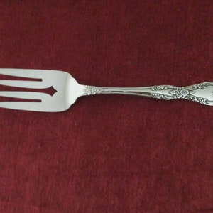 Lg Stainless Meat Serving FORK from ONEIDA Silverware/Flatware in the GALVESTON Pattern Shaped Handle w/Fancy Floral Design Good Used Cond!