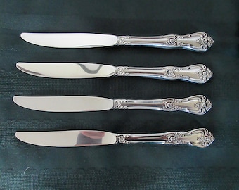4 Stainless Dinner KNIVES from ONEIDA Premier Flatware in the Elegant PRESIDENT Pattern Shaped Handles w/Flowers & Scrolls  Great Condition!