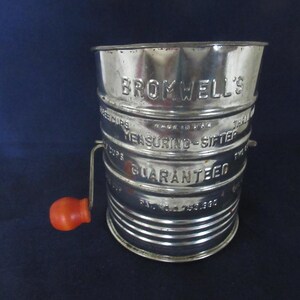 Vintage 1950's Upcycled 5 Cup  Metal/Tin Flour SIFTER with Handle and Little Wooden Knob from BROMWELL'S  Lightly Used Condition