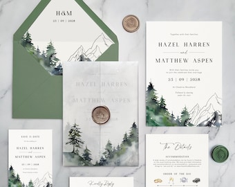 May include: A wedding stationery set featuring a green envelope with a mountain and forest illustration, invitation cards with watercolor pine trees and mountain line art, a vellum overlay with a wax seal, and RSVP cards with black text.