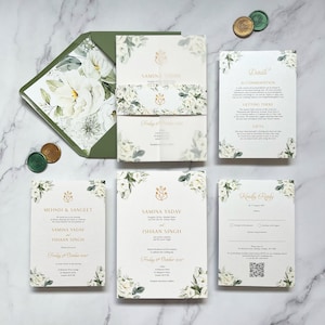 May include: Wedding invitation suite with green and white floral designs. The invitation cards feature the names "Samina Yadav" and "Ishaan Singh" with the date "Friday 6th October 2022".
