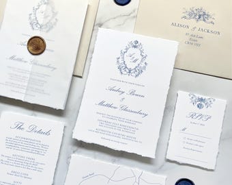 Vintage Blue Wedding Invitation. Custom Dusty Blue Royal Monogram with velum wrap and envelope liner on luxury textured card with torn edges