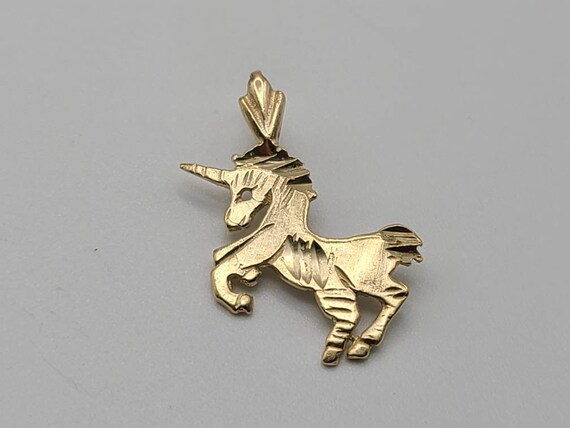 Unicorn charm hotsell gold