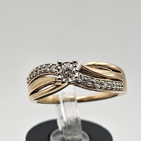 10k Yellow Gold Diamond Stackable Infinity Design Band Ring .11 CTW 10k Yellow Gold Diamond Stackable Infinity Design Band Ring .11 CTW