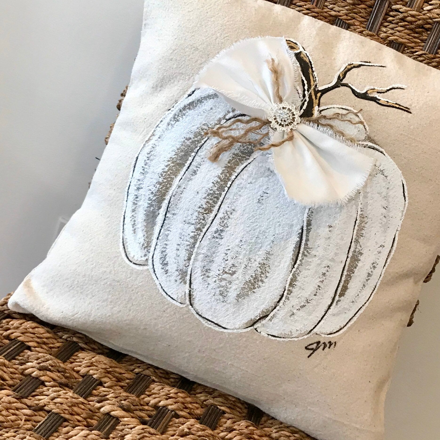 white pumpkin pillow