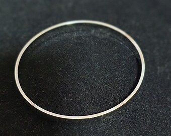 Pre 1990's Anson Silver Tone Smooth Surface Bangle Bracelet
