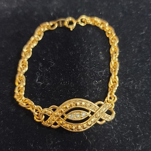 Pre 1980&#39;s Signed Avon Gold Tone and Rhinestone Bracelet