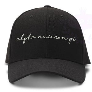 May include: Black baseball cap with white embroidered text that reads "alpha omicron pi".