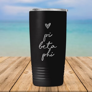 May include: Black stainless steel tumbler with a white heart and the text "pi beta phi" in a handwritten font.
