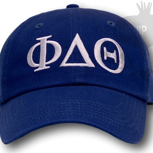 May include: A blue baseball cap with white embroidered letters that spell "ΦΔΘ".