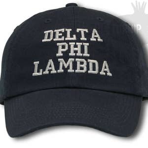 May include: A navy blue baseball cap with white embroidered text that reads "DELTA PHI LAMBDA".