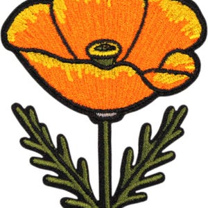 May include: An embroidered patch featuring a vibrant orange California poppy flower with yellow highlights and a dark green stem with two serrated leaves. The entire design is outlined in a thick black border, creating a distinct shape.