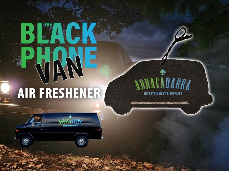 May include: Black van air freshener shaped like a van with the text "The Black Phone Van" and "Abrac-a-Dabbra Entertainment & Supplies" on it.