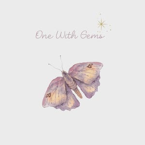 May include: A watercolor illustration of a butterfly with soft purple and yellow wings, featuring the text One With Gems in a cursive font above it, accompanied by a small gold starburst icon on a light gray background.