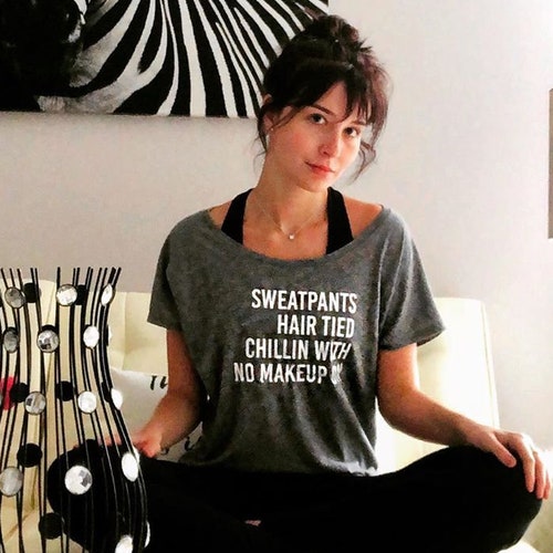 Sweatpants Hair Tied Chilling With No Makeup On Flowy Tee, Dolman Style T-Shirt, Boat Neck Tee, Wide Neck Shirt, Off Shoulder Tee, Chillin